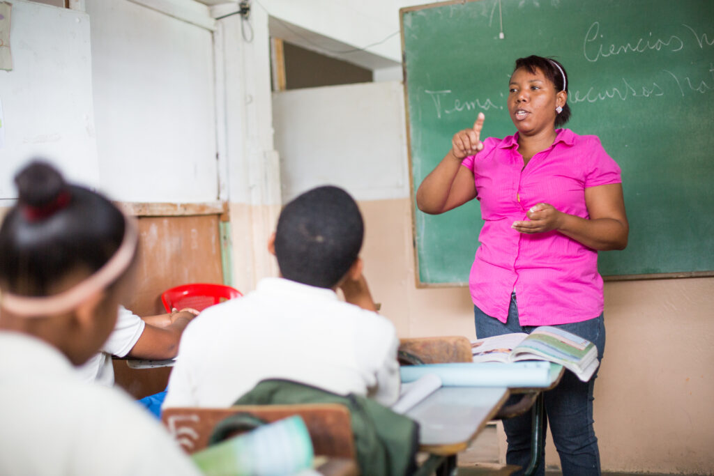 Teacher and students in the Dominican Republic