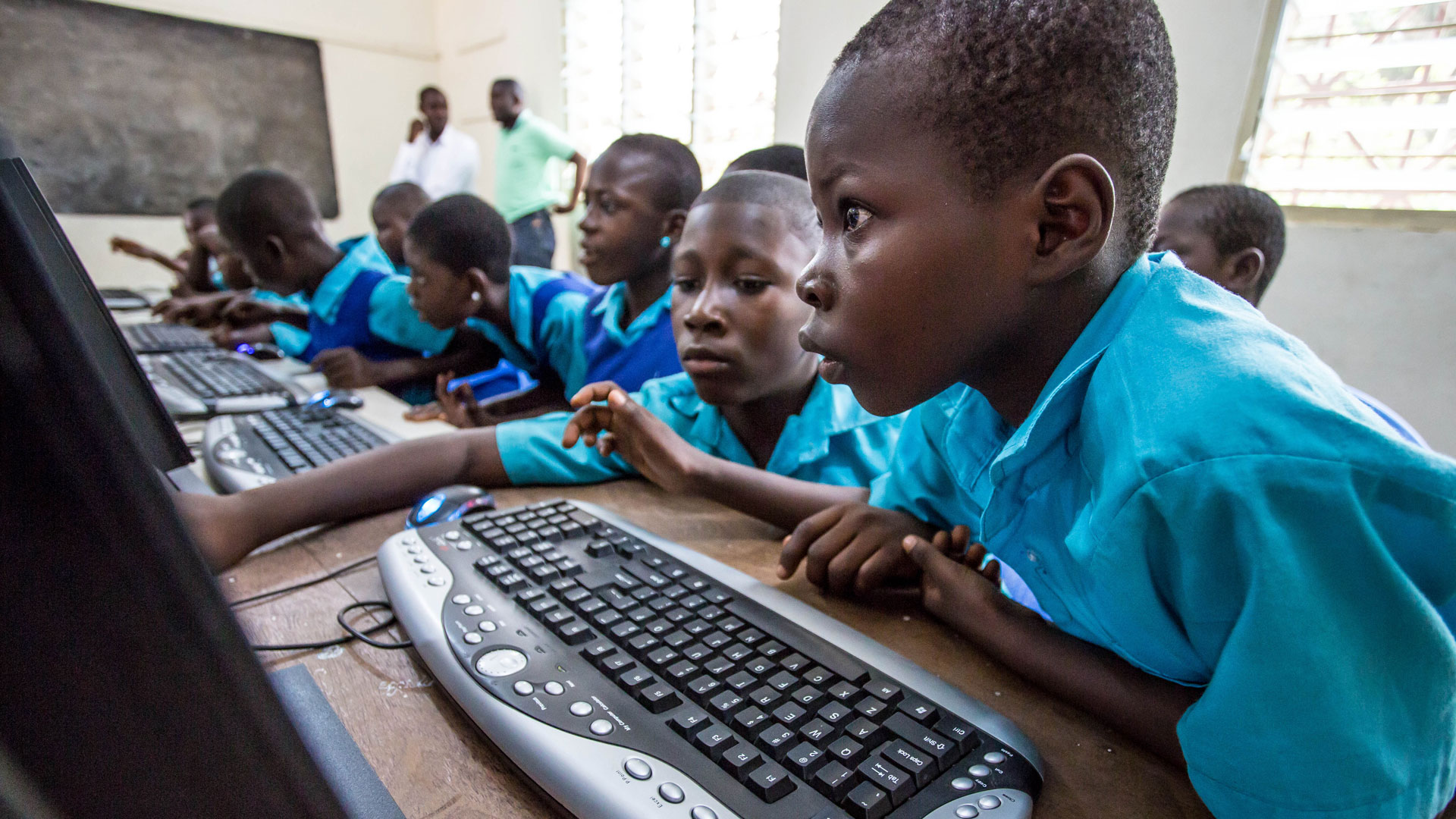 Student on the computer in a Partner School in Ghana.