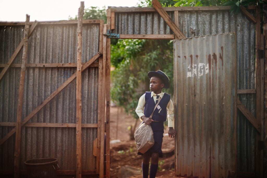 Student in Sierra Leone walking to school